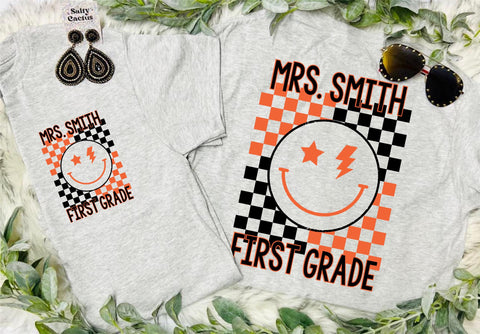 Checkered Smile Mascot Front Pocket and Big On Back Design on Grey Tee